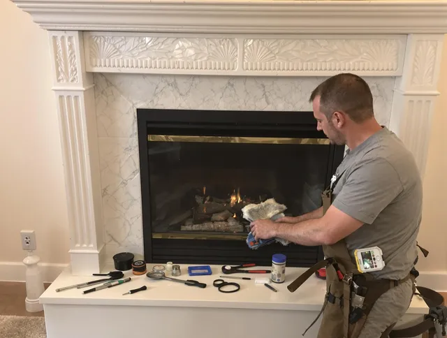 Deerfield Beach Chimney Sweep performing fireplace maintenance in Deerfield Beach, FL